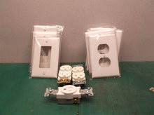 Assorted face plates and plugs