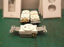 Assorted face plates and plugs