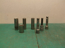 assorted lot of 2 extensions 4 sockets, 13mm, 17mm, 1/2, 3/8 and 3/8 hex