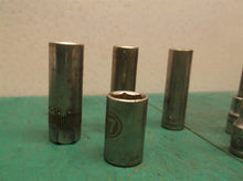 assorted lot of 2 extensions 4 sockets, 13mm, 17mm, 1/2, 3/8 and 3/8 hex