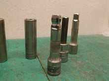 assorted lot of 2 extensions 4 sockets, 13mm, 17mm, 1/2, 3/8 and 3/8 hex
