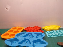 lot of 6 ice cube makers 1 pumpkin, 1 butterfly, 1 dog bone and paw, 3 mickey mo