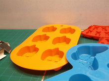 lot of 6 ice cube makers 1 pumpkin, 1 butterfly, 1 dog bone and paw, 3 mickey mo