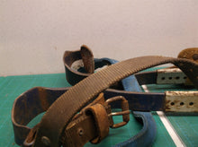 Set of 2 pole climbing spikes missing one strap