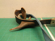Set of 2 pole climbing spikes missing one strap