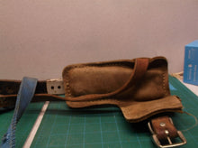 Set of 2 pole climbing spikes missing one strap