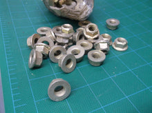 105 3/8-16 top lock flange nuts grade g yellow zinc