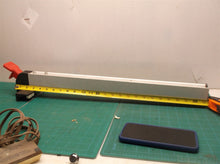 Table saw fence of unknown fitment 25 3/4 over all