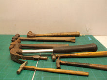 lot of hammers with and without handles