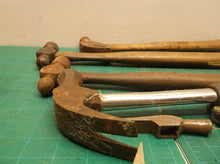 lot of hammers with and without handles