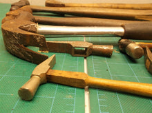 lot of hammers with and without handles