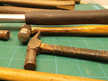 lot of hammers with and without handles