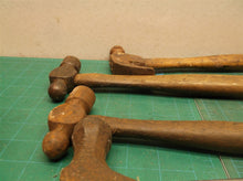 lot of hammers with and without handles