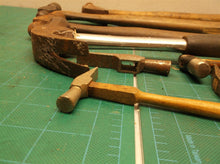 lot of hammers with and without handles