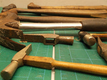 lot of hammers with and without handles