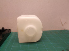 Tank and housing from an unbranded soap/sanitizer dispenser