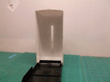 Tank and housing from an unbranded soap/sanitizer dispenser