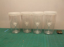 Set of 4 plastic cups with lids that look like wine glasses