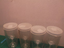 Set of 4 plastic cups with lids that look like wine glasses
