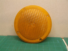7" round amber lens with 4 screw holes