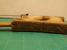 vintage hack saw with wooden handle