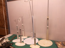lot of 6 doll stands 2 large base & 4 smaller oval bases
