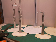 lot of 6 doll stands 2 large base & 4 smaller oval bases
