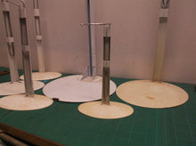 lot of 6 doll stands 2 large base & 4 smaller oval bases