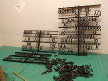 Lot of assorted small black letters for sign with 2 pin attachment