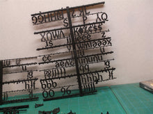 Lot of assorted small black letters for sign with 2 pin attachment