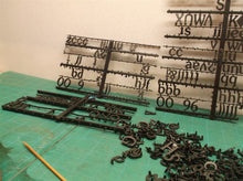 Lot of assorted small black letters for sign with 2 pin attachment