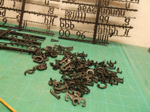 Lot of assorted small black letters for sign with 2 pin attachment