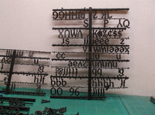 Lot of assorted small black letters for sign with 2 pin attachment