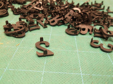Lot of assorted small black letters for sign with 2 pin attachment