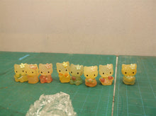 Lot of 8 cat statues