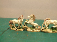 Lot of 6 horse statues