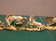 Lot of 6 horse statues