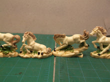 Lot of 6 horse statues