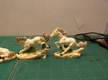 Lot of 6 horse statues