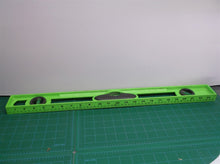 green 24 inch level with horizontal vertical and 5 degree leveling