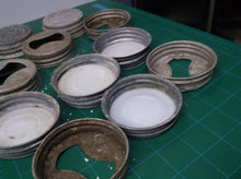 Lot of 11 fragile magnesium jar lids