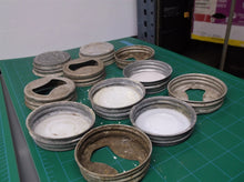 Lot of 11 fragile magnesium jar lids