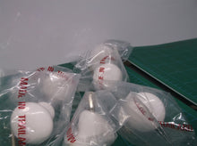 lot of 7 white cabinet knobs