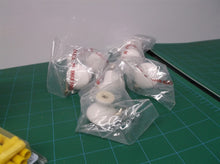 lot of 7 white cabinet knobs