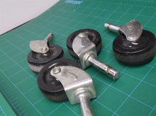 lot of 4 2 inch diameter black castors 11.11mm diameter stem