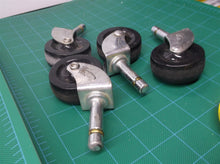lot of 4 2 inch diameter black castors 11.11mm diameter stem