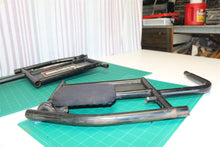 pair of arm rest brackets with hip pads for a 21st Century Scientific Inc Bounde
