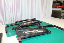 pair of arm rest brackets with hip pads for a 21st Century Scientific Inc Bounde