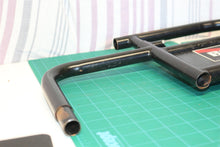 pair of arm rest brackets with hip pads for a 21st Century Scientific Inc Bounde