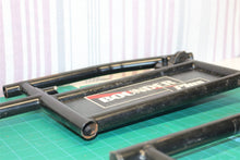 pair of arm rest brackets with hip pads for a 21st Century Scientific Inc Bounde